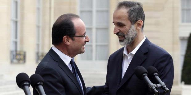 2159596 francois hollande dan ahmed moaz alkhatib 620X310 Rebelles syriens : qui est Ahmad Moaz Al Khatib ?